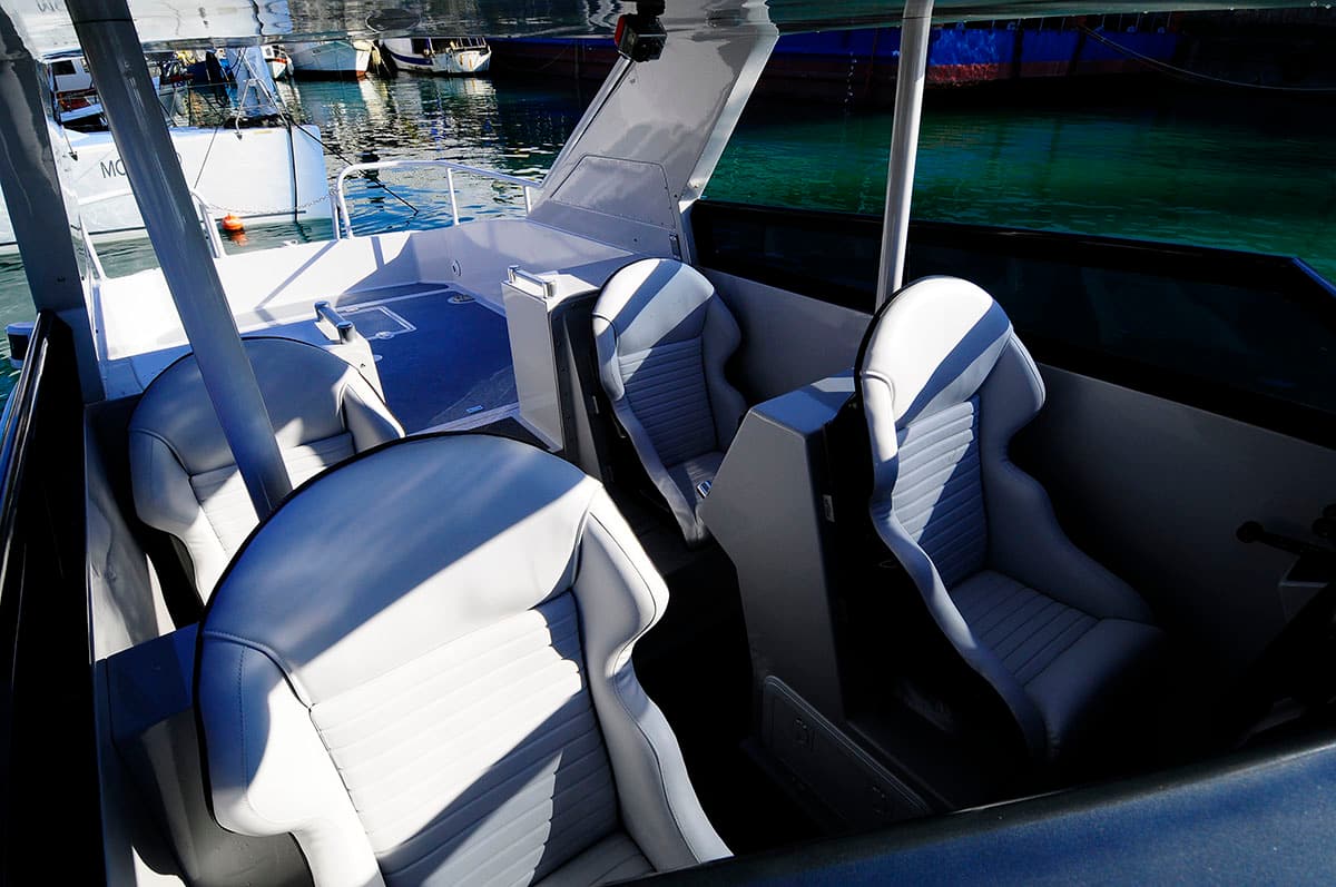 Shock-mitigating helm seats