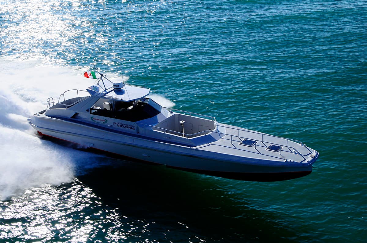 Grey Interceptor 49 SSI planing, aerial view