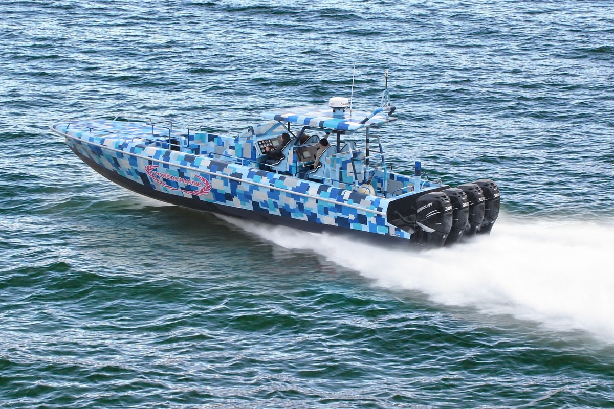 Power Marine Interceptor 43 at high speed, aft view